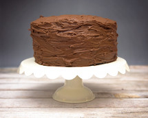 chocolate cake on a cake stand 