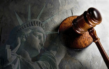 Statue of Liberty and judges gavel 
