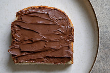 Closeup Tasty Slice Of Bread With Chocolate Cream