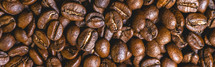 Background from coffee beans from above.