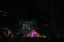 glowing pyramid at night 