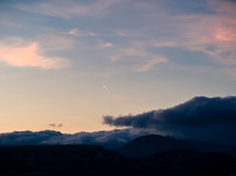 Blue hour over mountains silhouette