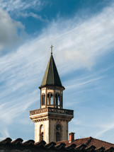 church bell tower on a light blue sky