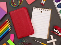 school supplies and notepad with copy space 