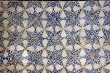 Decorative Arabic ceramic tiles on the floor of an Arabic university in Morocco