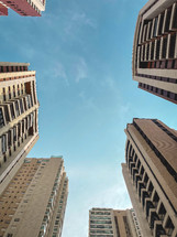 A view from under, looking at a view tall buildings, in Tatuape, Sao Paulo, Brazil.