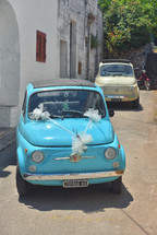 Monopoli, Italy - July 20 2017: Famous old fiat 500 cinquencento prepared for a wedding at the old town of Monopoli