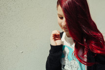 teen girl with bright red hair 