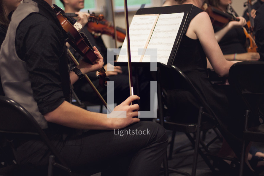 high school orchestra performing 