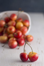Sweet and Beautiful Red and Yellow Golden Cherries on a White Background