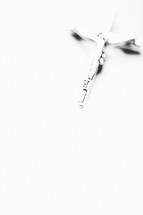 Silver crucifix.