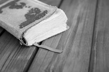 Bible on wood floor boards 