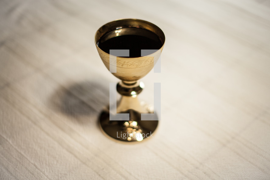 chalice full of wine for communion 