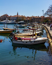 Budva, Montenegro - Water taxis line the boardwalk near Old Town Budva, ready to take tourists to the surrounding islands