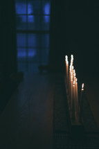 candles in a dark room 