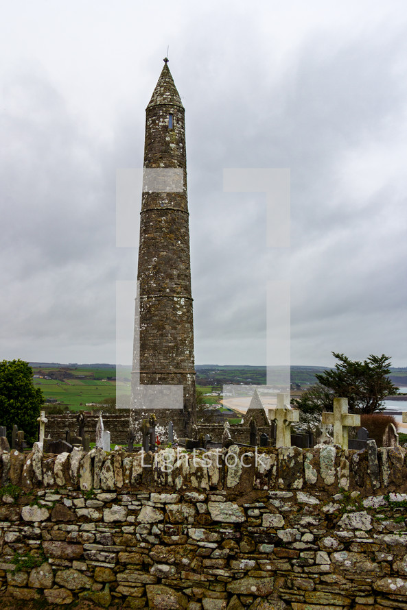 The site of an early Christian settlement, the Ardmore Round Tower is surrounded by a cemetery