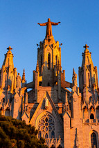 The Sacred Heart cathedral sits atop of Tibidabo above Barcelona