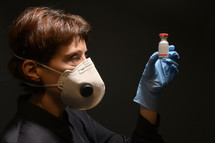 Woman Wearing Medical Protective Virus Mask and Vaccine