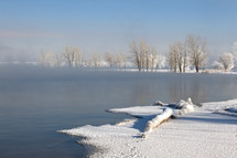 Foggy lake in the winter snow. Chatfield reservoir after a snow storm