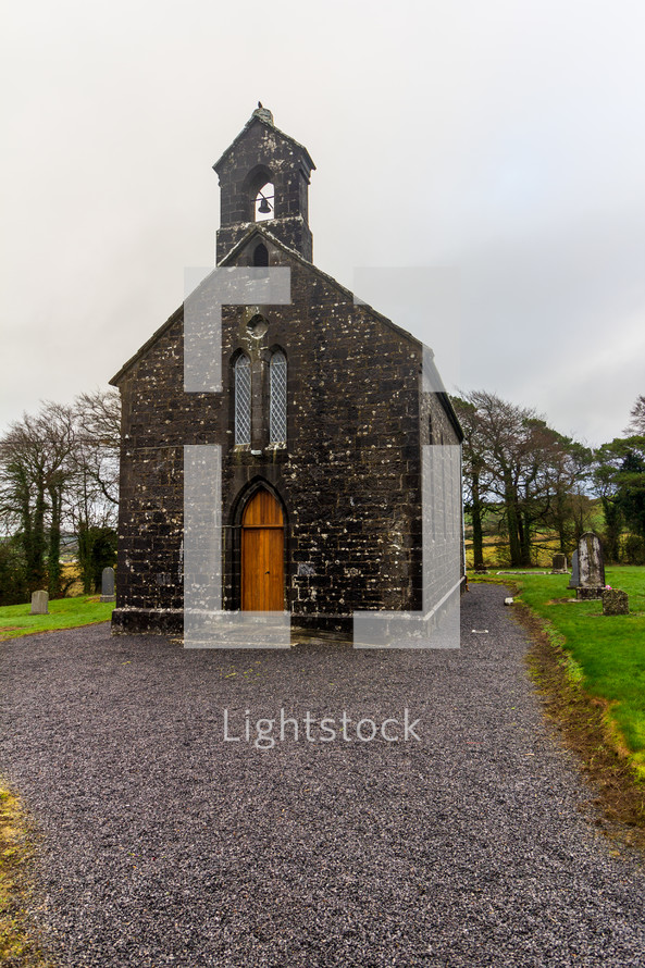The Holy Trinity Church is located below the Rock of Dunamase in County Laois, Ireland