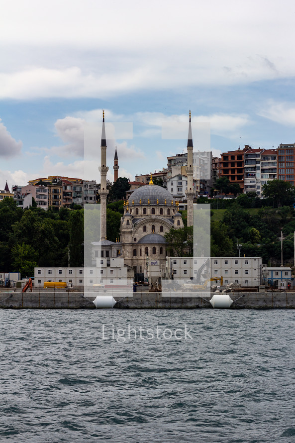 Istanbul, Turkey - View of the Dolmabah..e Mosque on the banks of the Bosphorus Strait
