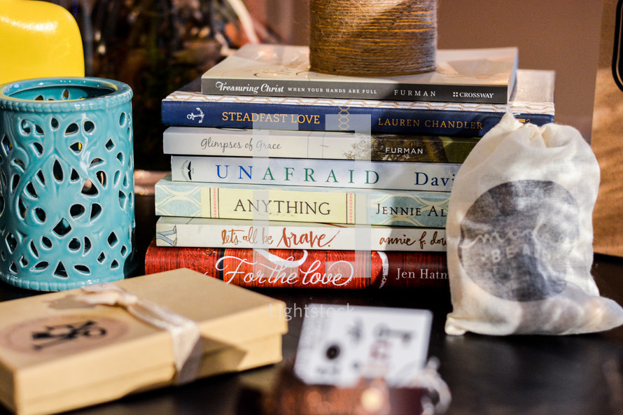 stack of books on a table 