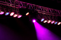 Purple stage lights during a concert