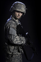 soldier holding a rifle 