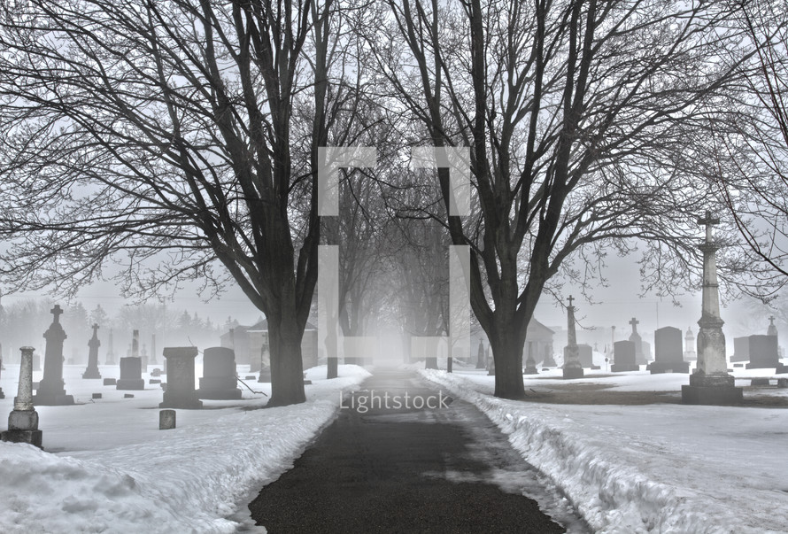 snow covered cemetery 