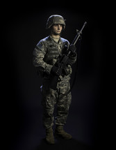 soldier holding a rifle 