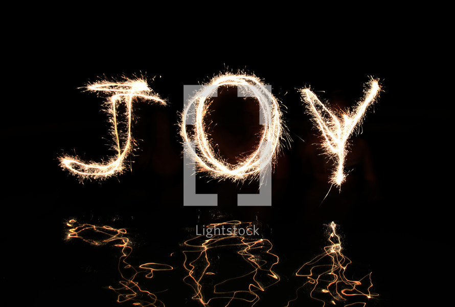 "Joy" written in fireworks.