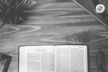 2 Peter, open Bible, Bible, pages, reading glasses, wood table 