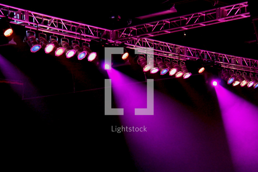 Purple stage lights during a concert