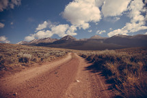 dirt road and mountains