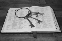 skeleton keys on an open Bible 