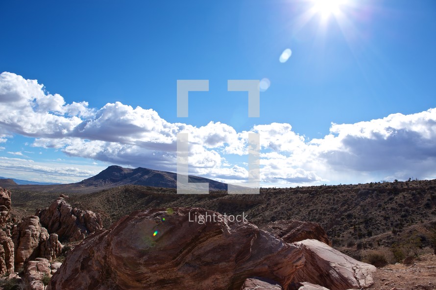 sunburst over Nevada landscape
