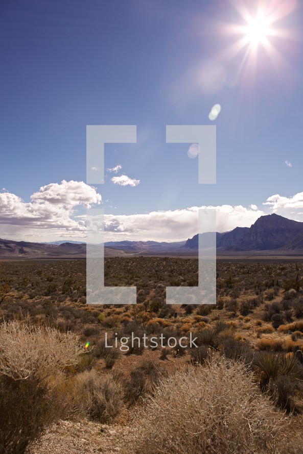 sunburst over Nevada landscape