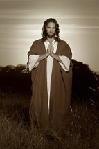 Jesus Christ with praying hands. 