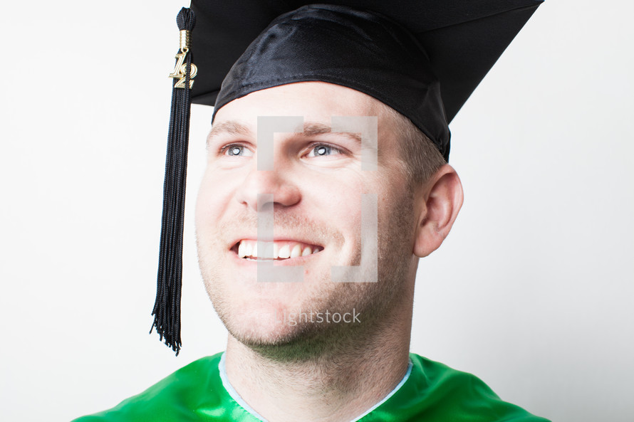 Smiling graduate.