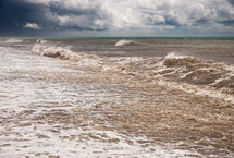 Waves washing onto a shore 