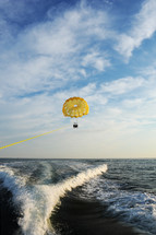 parasailing over the ocean 