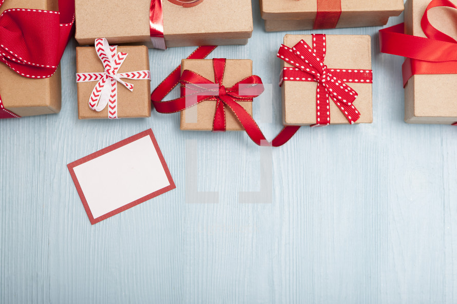 Christmas gift boxes on a light blue background 
