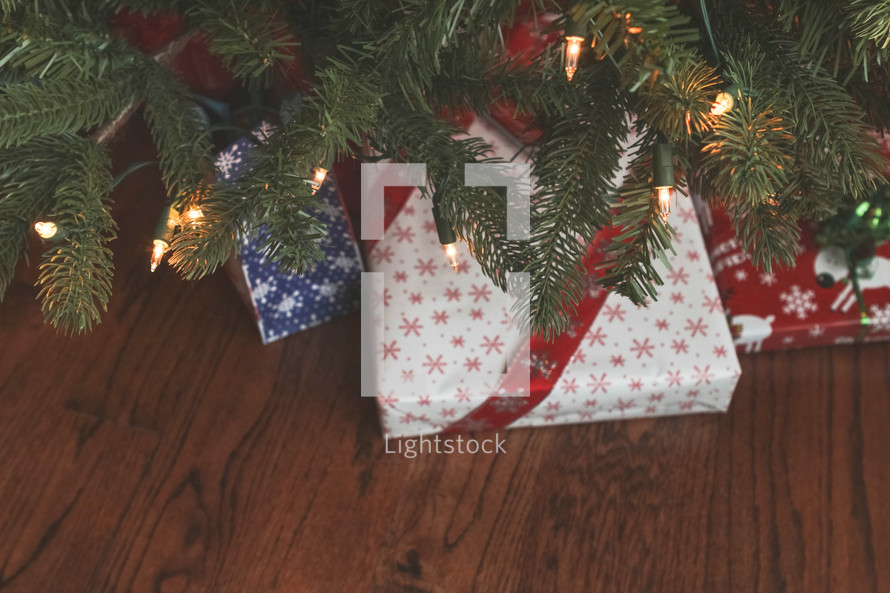 Christmas gifts under a Christmas tree 