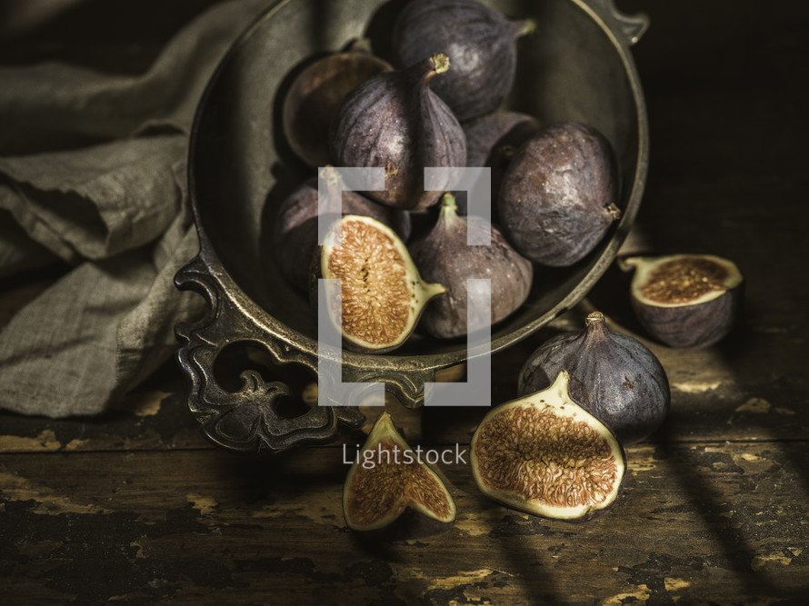 figs in a bowl on a table 