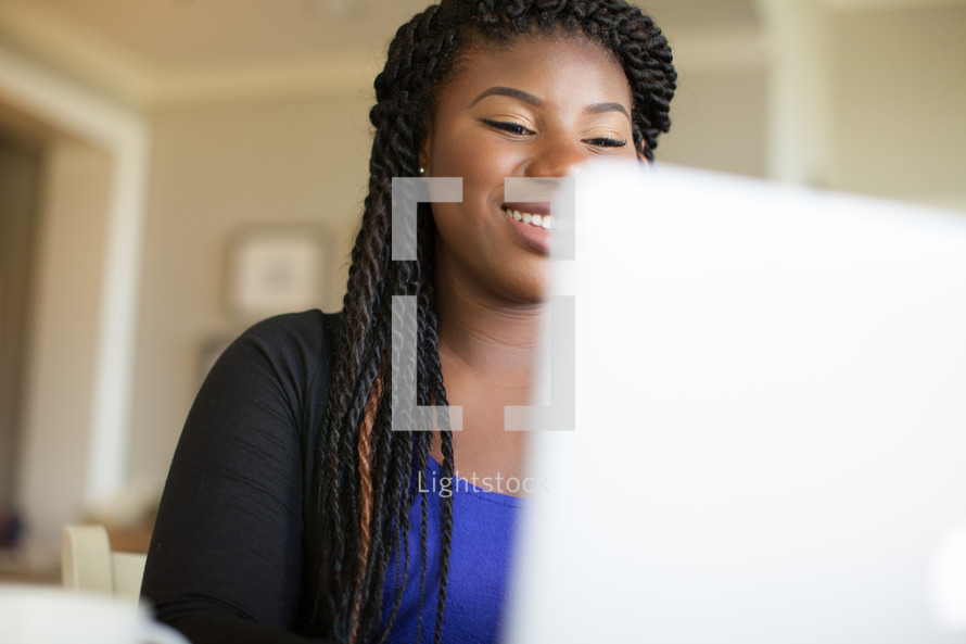 woman looking at a computer screen 