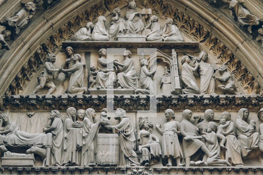 detailed carvings in the walls of Notre Dame 