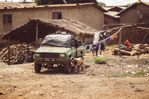 Old green broken down pickup truck Dusty village in the Ivory Coast West America