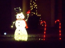 snowman and candy cane Christmas light display 