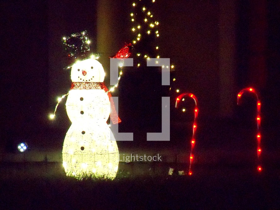 snowman and candy cane Christmas light display 