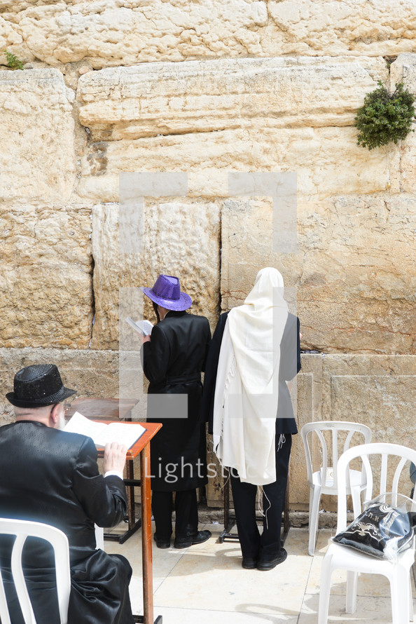 Orthodox Jews praying at the Western Wall in the Men Section.
